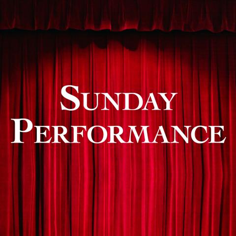 Image of a red curtain that you would find on a stage with a spotlight on it. "Sunday Performance" written over the curtain. 
