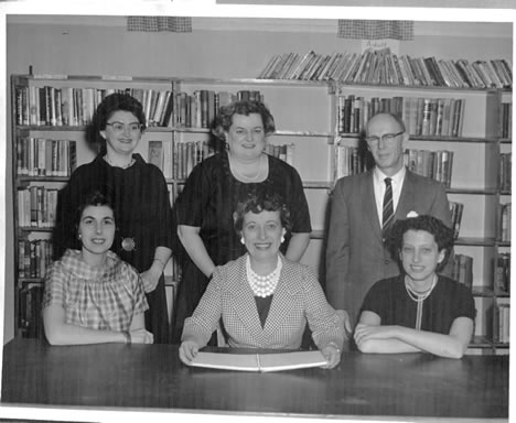 Black and white photo of the Library Trustees and Staff in 1961
