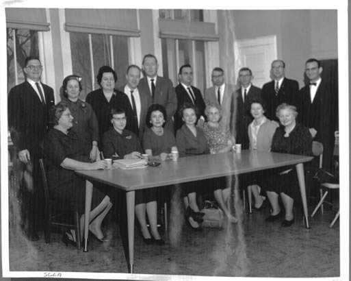 Black and white image of the Suffolk County Library Association meeting at the Melville library.