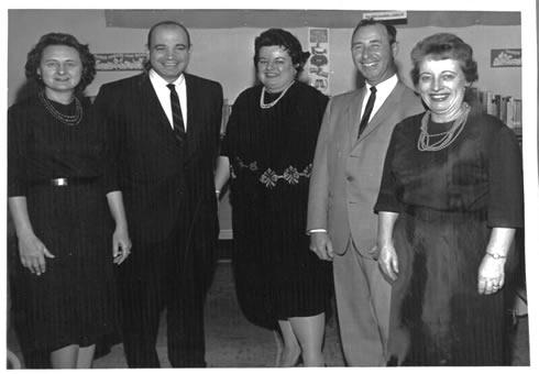 Black and white photo of the Board of Trustees: Mrs. Newhouse, Anthony Uzzo, Virginia Moran (director), Charles Booth, Ruth Freeze.