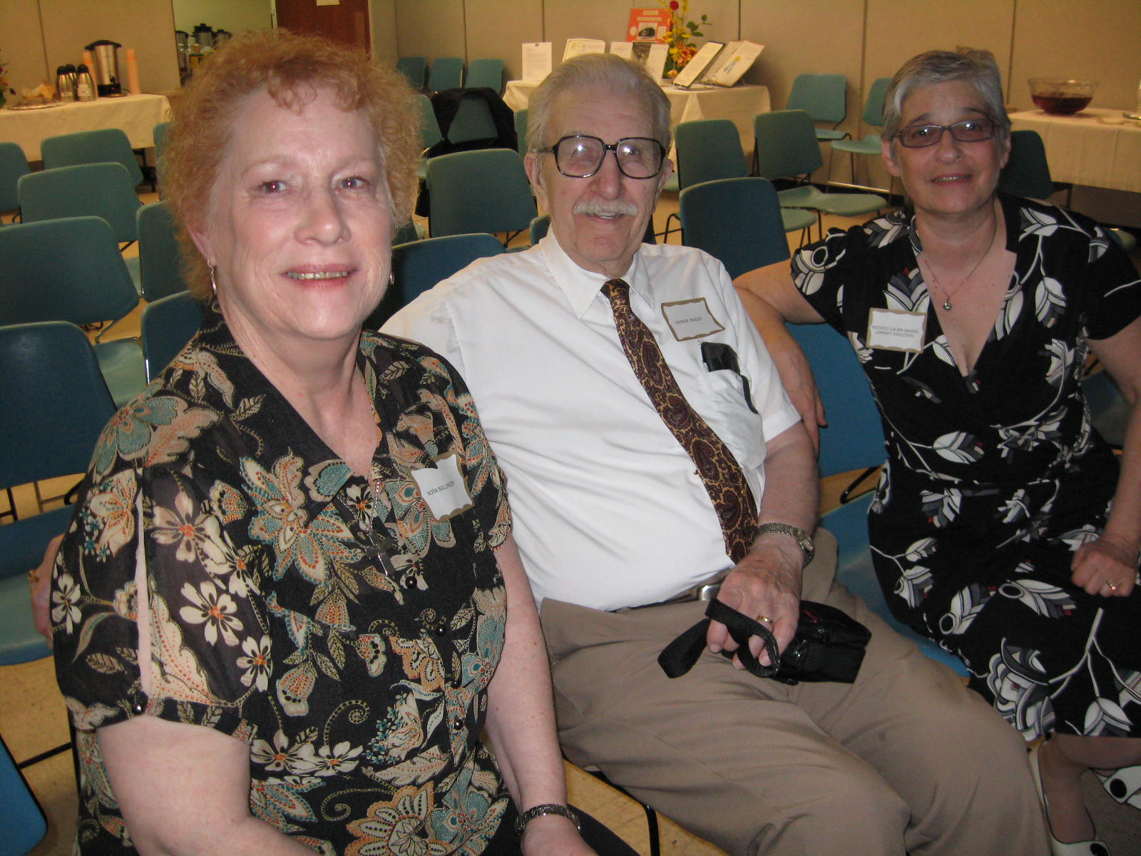 Image of George Freeze and Michele Lauer-Bader attending the Half Hollow Hills Community Library's 50th Birthday celebration in April 2009