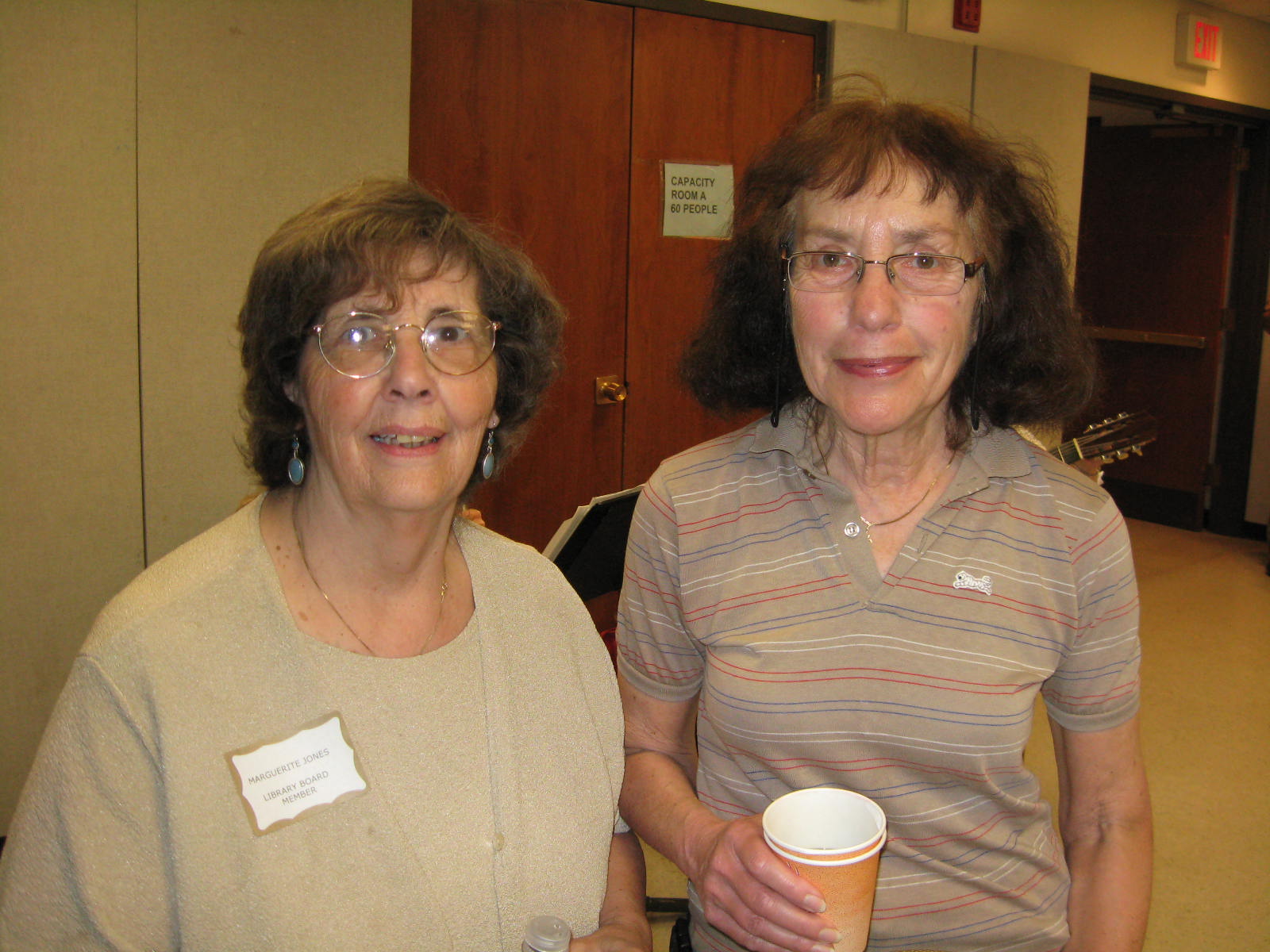 Image of Board member Marguerite Jones and friend attending Half Hollow Hills Community Library's 50th Birthday celebration in April 2009