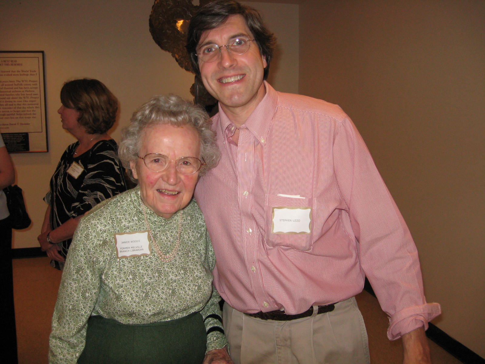 Image of  Janice Woods and Steve Uzzo attending the Half Hollow Hills Community Library's 50th Birthday celebration in April 2009
