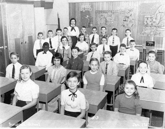 Black and white photo of the Sunquam School picture in 1957 with teacher Helen Smagorinsky