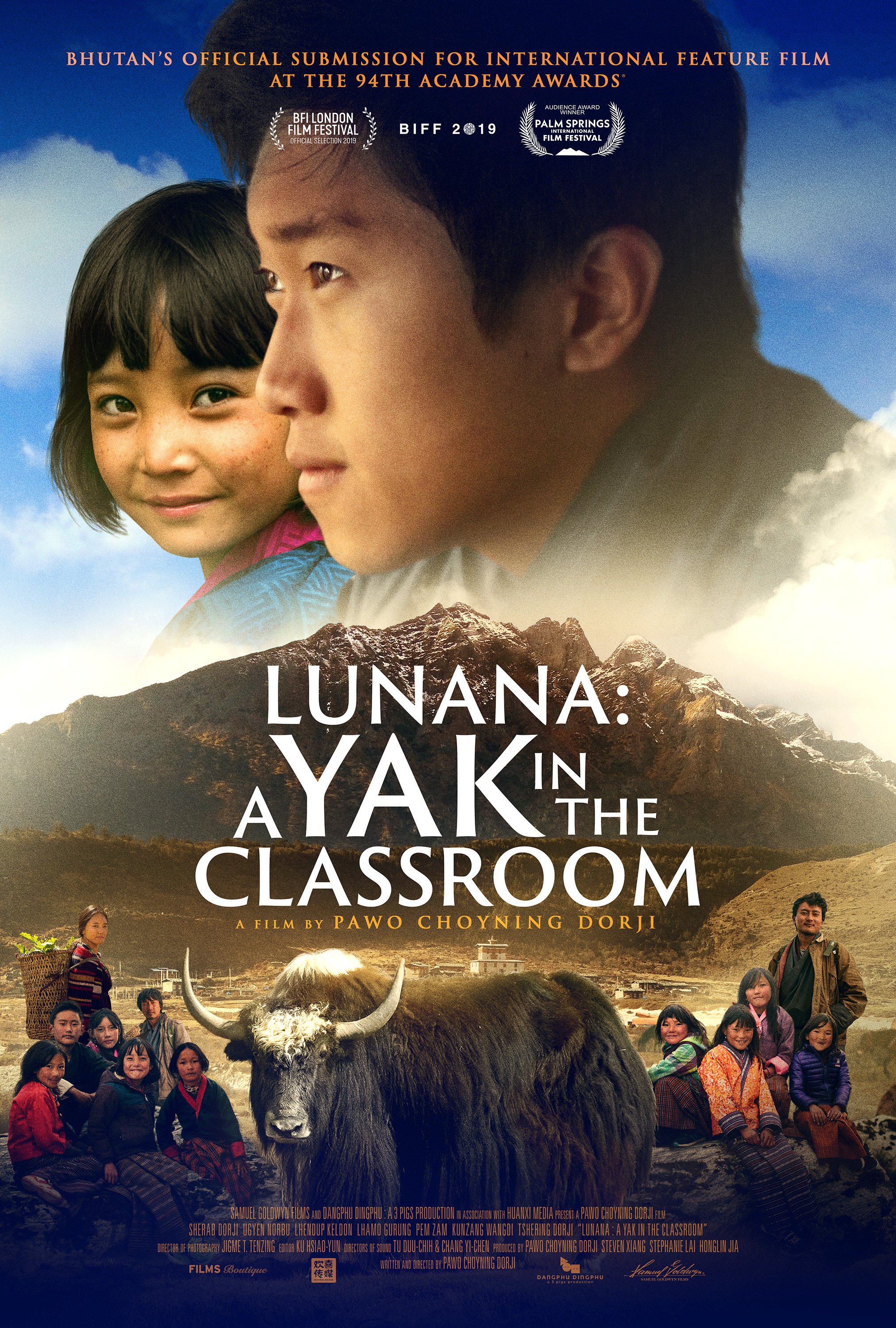 Image of the movie cover for Lunana: A Yak in the Classroom featuring a large yak standing in the midst of a village gathering. 