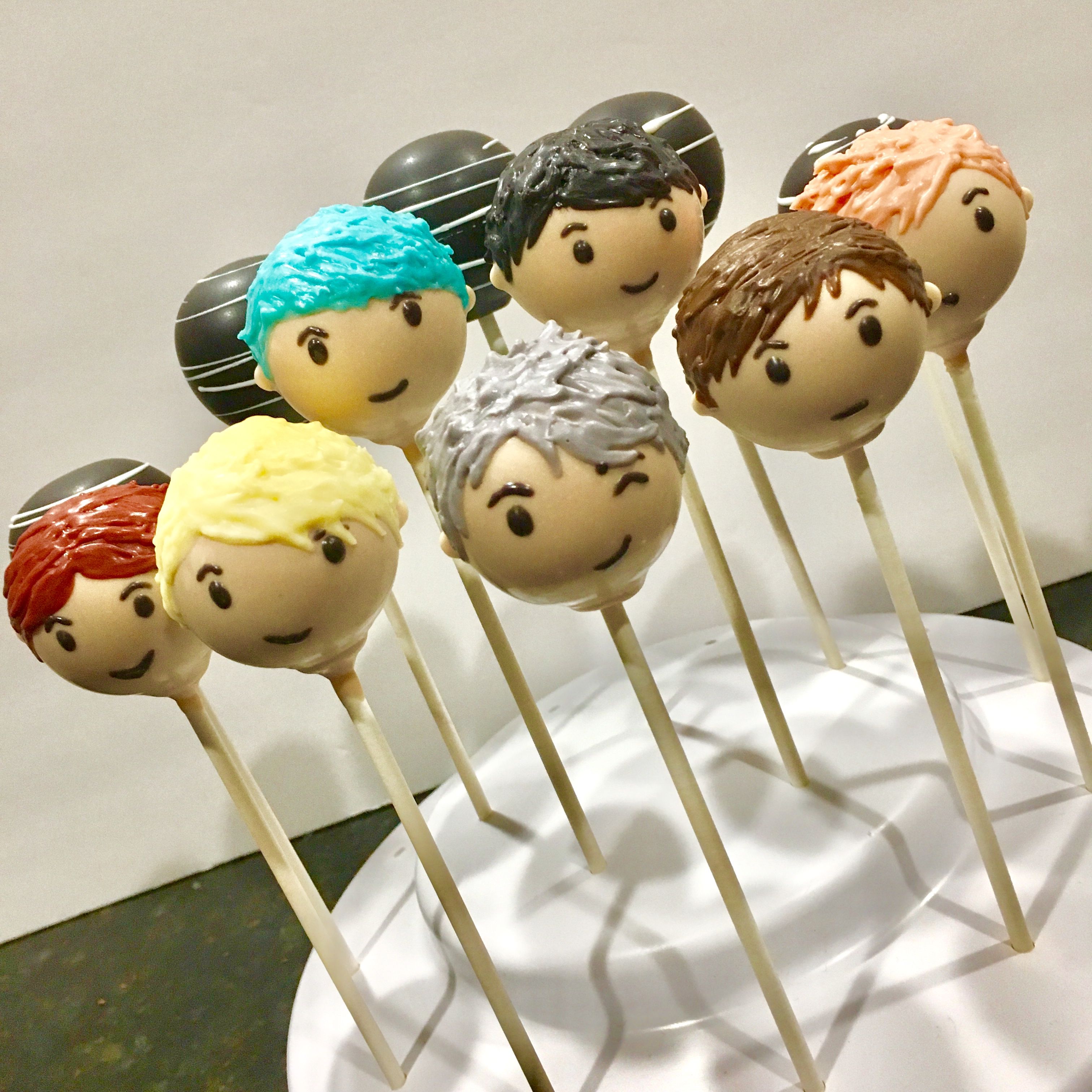 image of K-Pop themed cake pops with different icings as hair