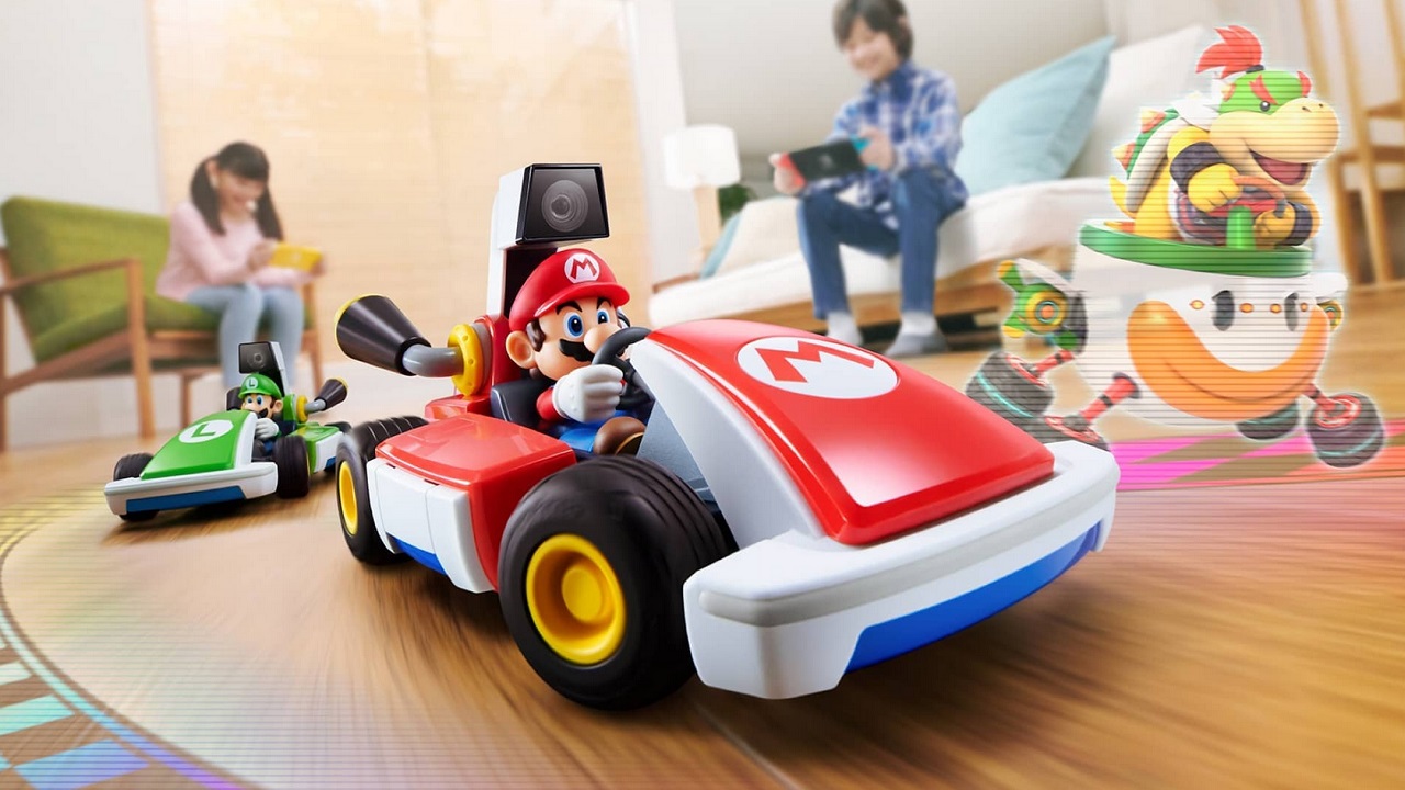 Image of Mario, Luigi, and Bowser Jr. of the Super Mario Brothers riding go carts. 