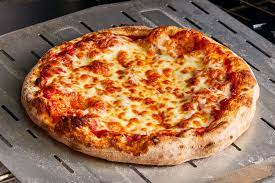 Photo of a freshly baked cheese pizza. 