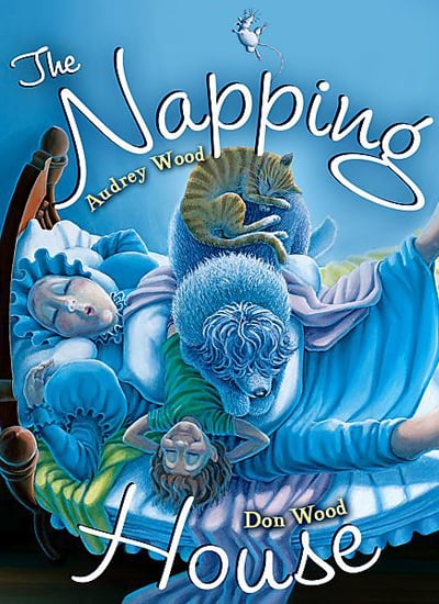 Image of the book cover Napping House. Cartoon image of an older lady, child and dog sleeping soundly on a sunken bed.