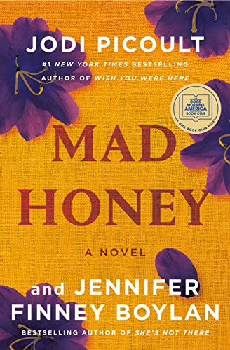 Image of the featured book cover featuring a gold background with purple flowers