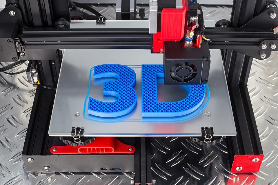 Image of a 3D printer printing a the number and letter "3D" in blue.