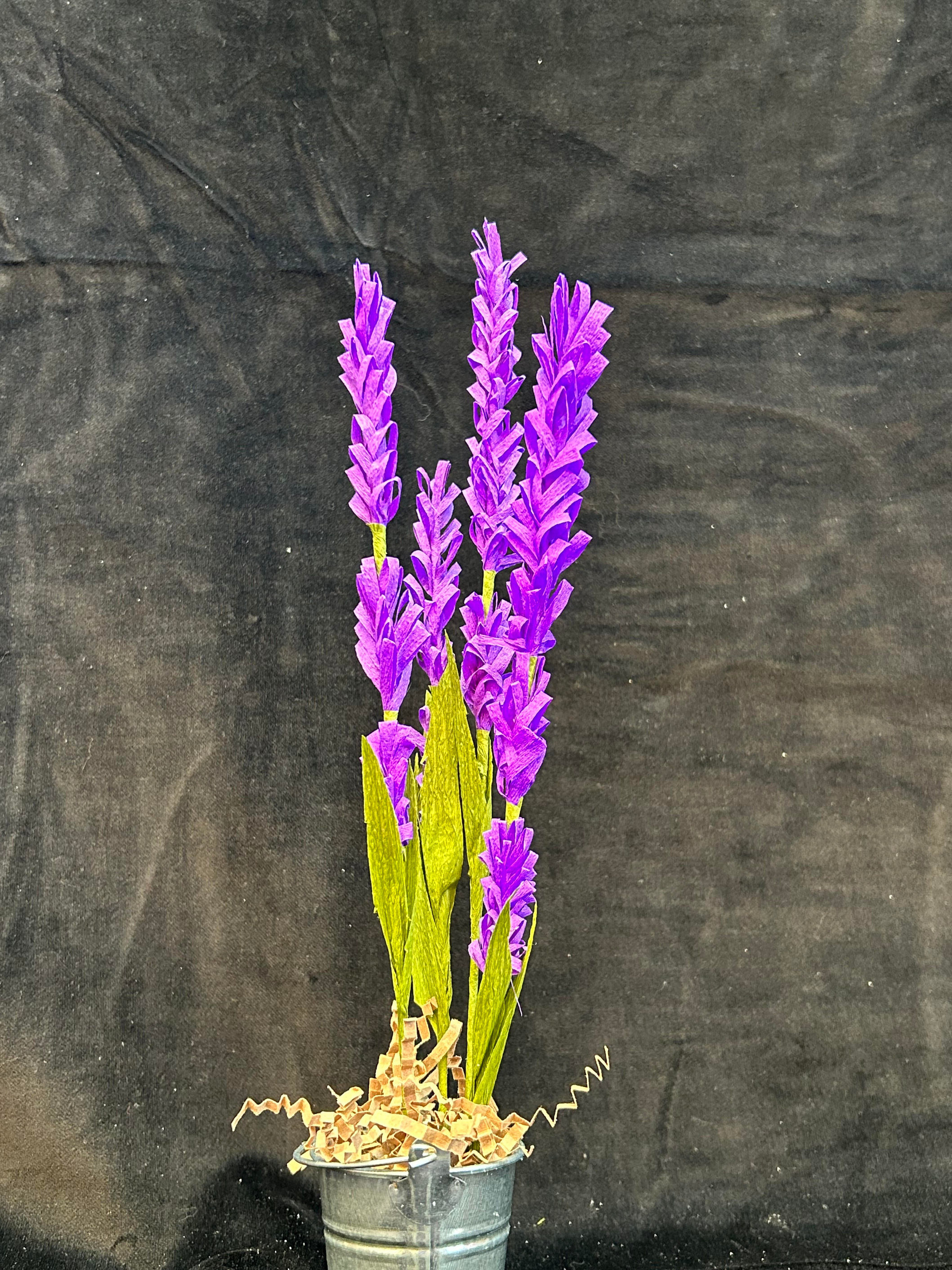 Photograph of the craft, stalk of crepe paper Lavender Flower in a metal pot 
