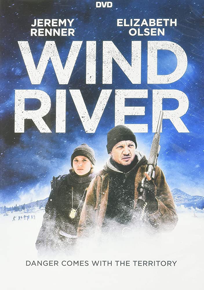 Image of Movie Cover featuring a man and woman dressed for very cold weather walking through the snow.  
