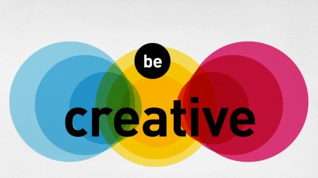 Graphic of colorful circles with the words be creative