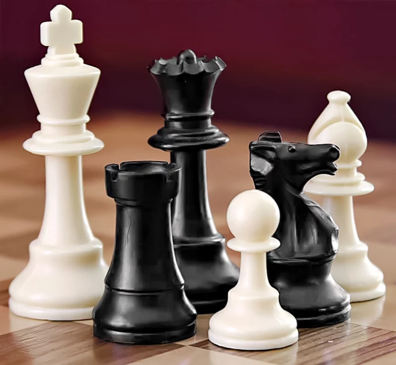 Image of a few chess game pieces. 
