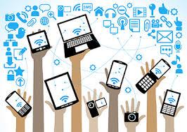 Clipart picture of hands in the air holding different digital devices like phones, tablets and laptops. 