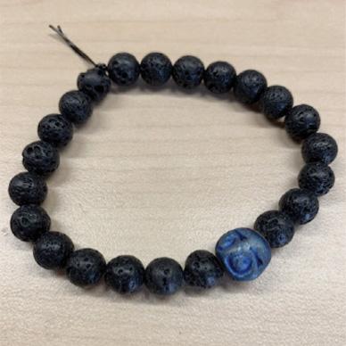 Photo of the craft. Black beaded lava bracelet. 