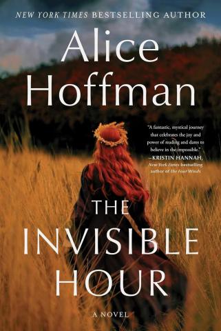 Image of the book cover featuring an image of the back view of a woman with long red hair in a field of tall brown grass.