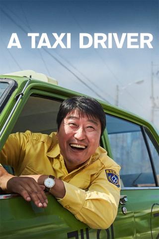 Image of the movie poster featuring a man with his head and arms outside the driver's window of a car. The man is smiling. 