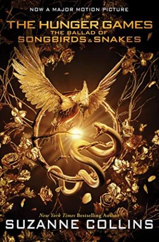 The Ballad of Songbirds and Snakes movie poster featuring a gold mockingjay and snake in the center of the poster.