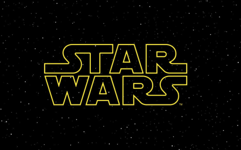 Star Wars Logo in yellow over a starry black sky