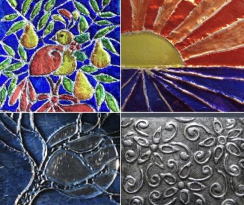 Four tin foil art boxes, showing colorful engravings in the four quadrants of the image, the top left appears to be birds in a pear tree, the top right is a sunset over water, and the bottom two are more abstract swirls and shapes of grays and blues.