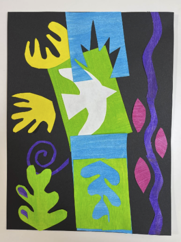 Abstract shapes cut from paper, mostly green, blue, yellow, purple, white, and pink on a black background.