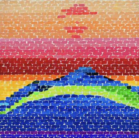 An abstract blue/purple/green mountain painted with rectangular blots beneath an orange and pink sunset with blocky pink clouds.