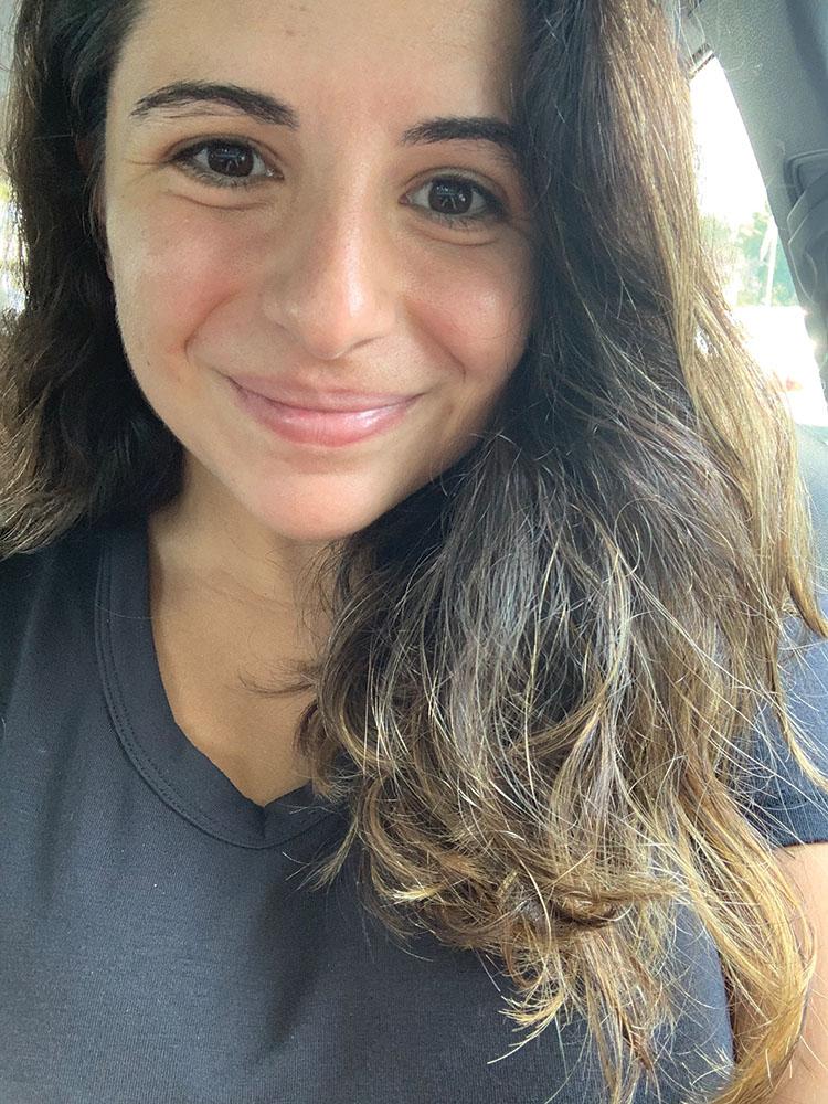 Picture of Marisa, our SBU Student Intern. Long dark hair and brown eyes.