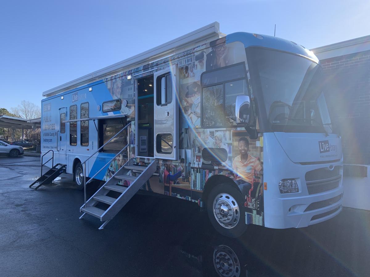 Big winnebago that serves as a mobile library.