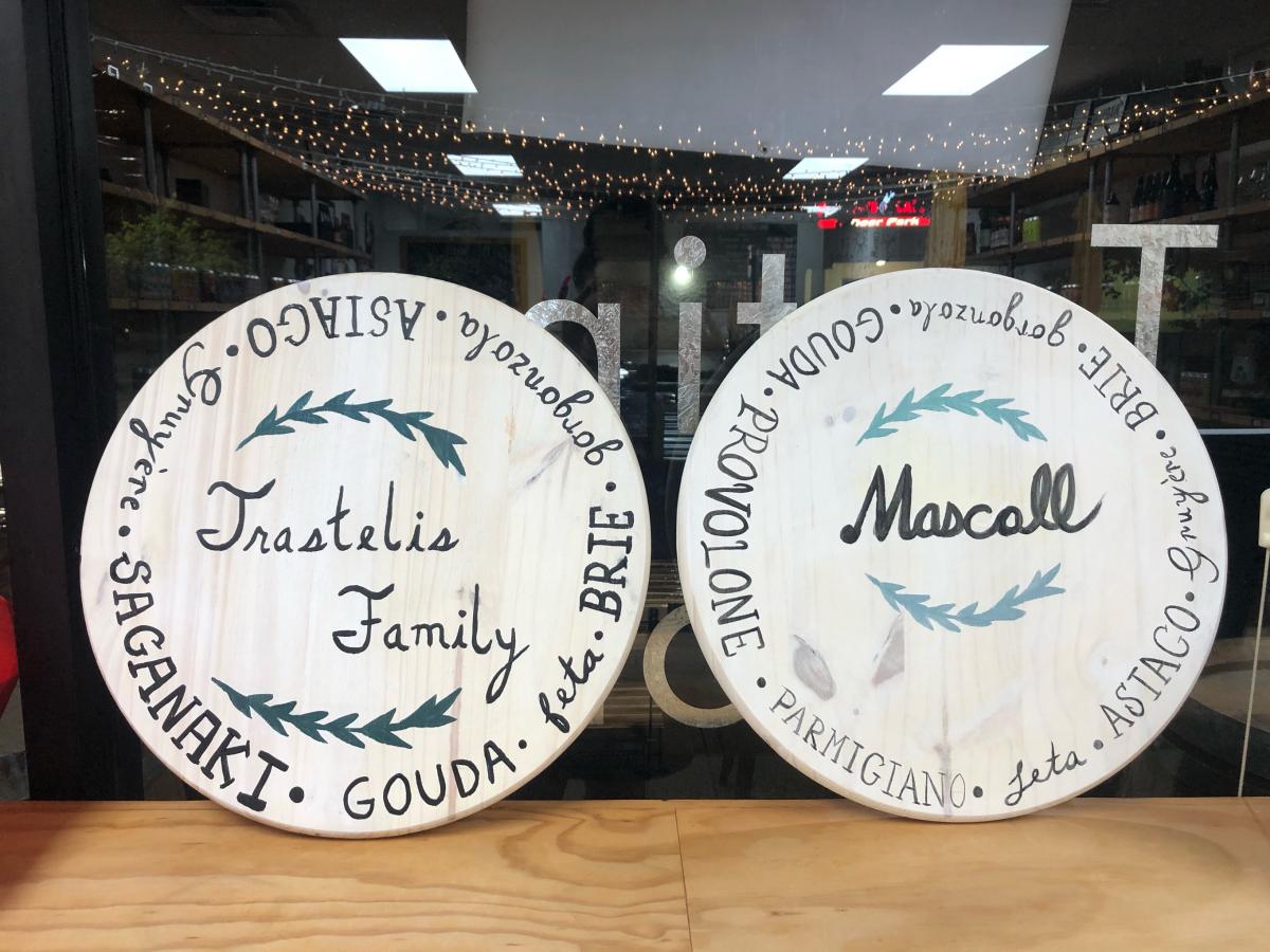 Image of the craft. Round wooden board painted and with personalized writing painted on. 