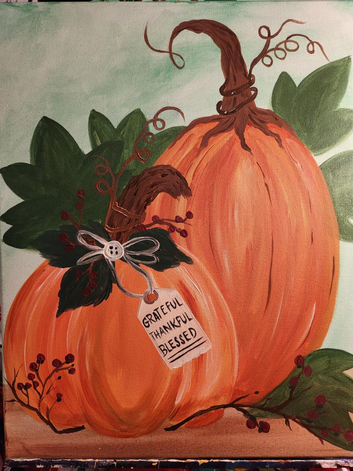 Image of painting featuring 2 orange pumpkins painted on canvas. 