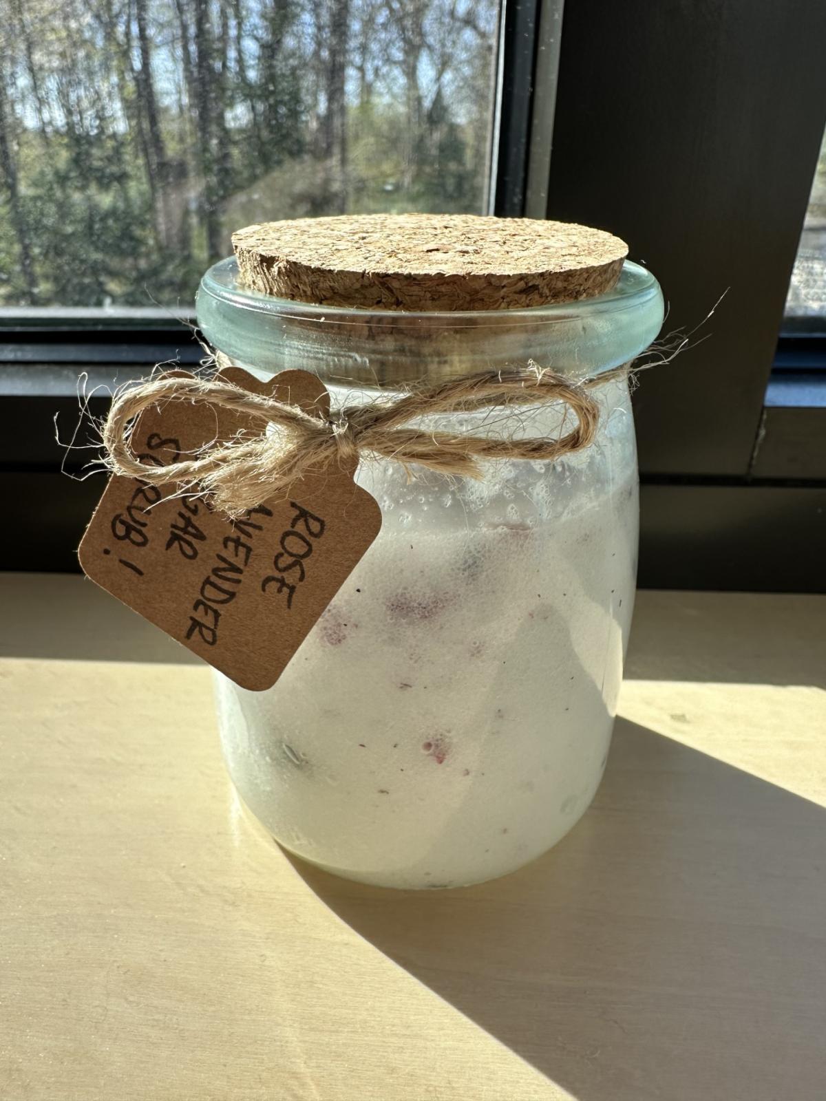 Image of the craft featuring a little mason jar filled with the scrub mixture.