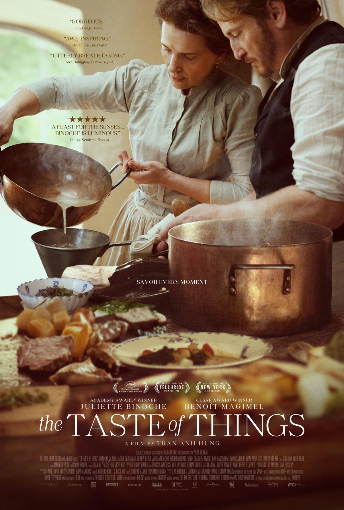 Image of the movie poster featuring a man and a woman cooking.