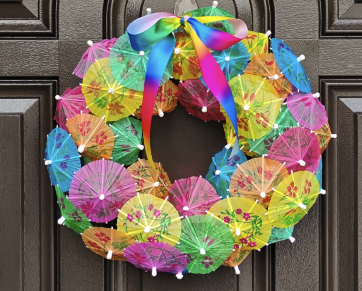 Image of the craft featuring a circle wreath made up of colorful cocktail umbrellas